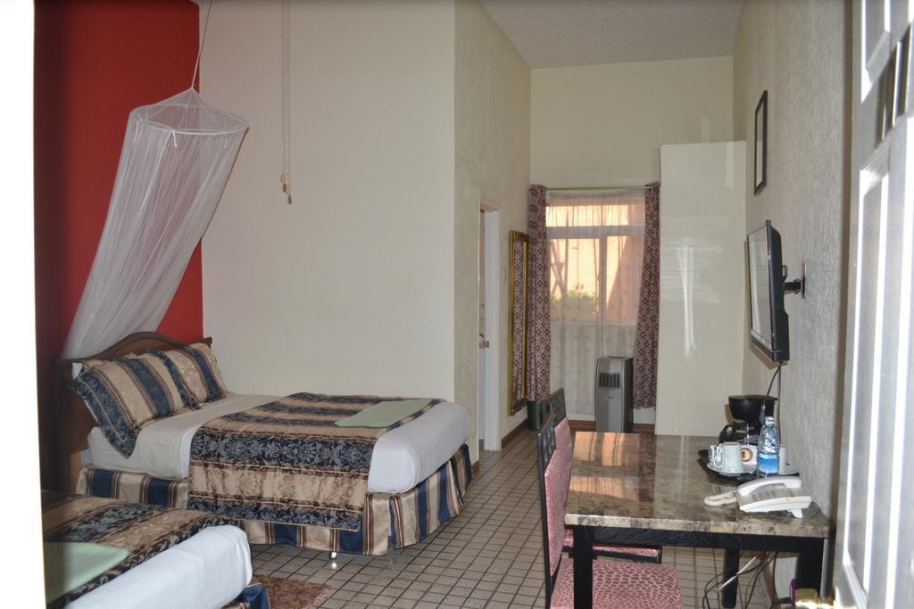 Executive Airport Hotel Entebbe Szoba fotó